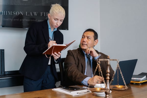 Lawyers discussing documents